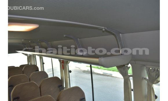 Acheter Import Voiture Toyota Coaster Blanc à Import - Dubai, Artibonite Acheter Import Voiture Toyota Coaster Blanc à Import - Dubai, Artibonite