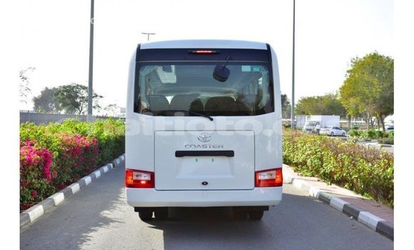 Acheter Import Voiture Toyota Coaster Blanc à Import - Dubai, Artibonite Acheter Import Voiture Toyota Coaster Blanc à Import - Dubai, Artibonite