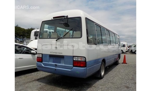 Acheter Import Voiture Toyota Coaster Blanc à Import - Dubai, Artibonite Acheter Import Voiture Toyota Coaster Blanc à Import - Dubai, Artibonite