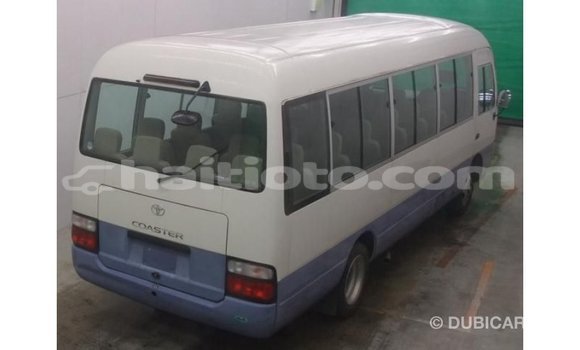 Acheter Import Voiture Toyota Coaster Blanc à Import - Dubai, Artibonite Acheter Import Voiture Toyota Coaster Blanc à Import - Dubai, Artibonite