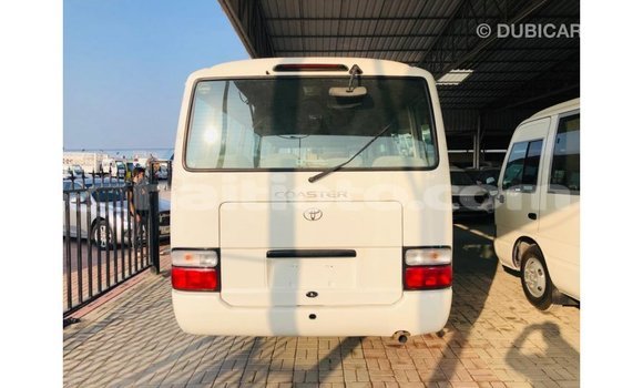 Acheter Import Voiture Toyota Coaster Blanc à Import - Dubai, Artibonite Acheter Import Voiture Toyota Coaster Blanc à Import - Dubai, Artibonite
