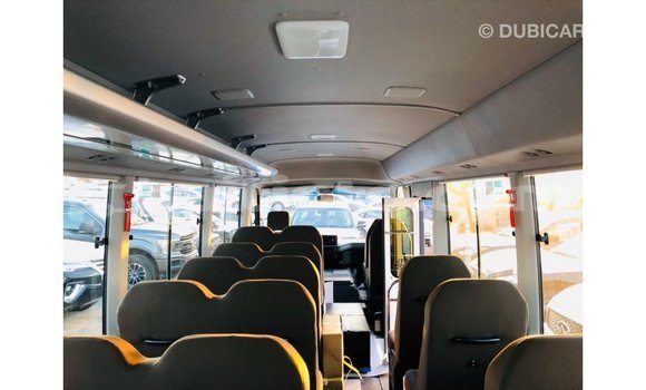 Acheter Import Voiture Toyota Coaster Blanc à Import - Dubai, Artibonite Acheter Import Voiture Toyota Coaster Blanc à Import - Dubai, Artibonite
