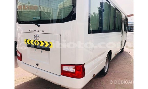 Acheter Import Voiture Toyota Coaster Blanc à Import - Dubai, Artibonite Acheter Import Voiture Toyota Coaster Blanc à Import - Dubai, Artibonite