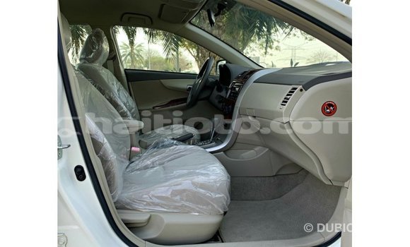 Acheter Import Voiture Toyota Corolla Blanc à Import - Dubai, Artibonite Acheter Import Voiture Toyota Corolla Blanc à Import - Dubai, Artibonite