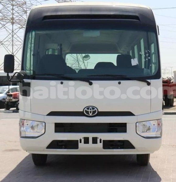 Big with watermark toyota coaster nord cap haitien 4154