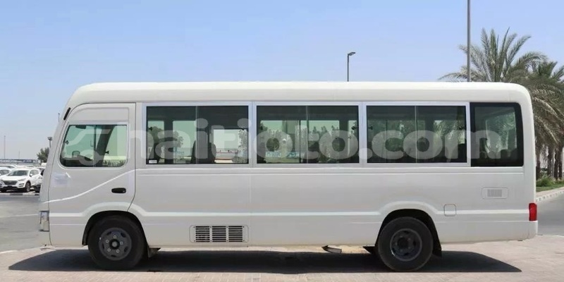 Big with watermark toyota coaster nord cap haitien 4154
