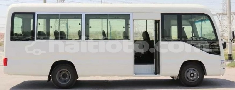 Big with watermark toyota coaster nord cap haitien 4154