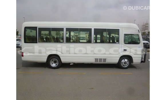 Acheter Import Voiture Toyota Coaster Blanc à Import - Dubai, Artibonite Acheter Import Voiture Toyota Coaster Blanc à Import - Dubai, Artibonite